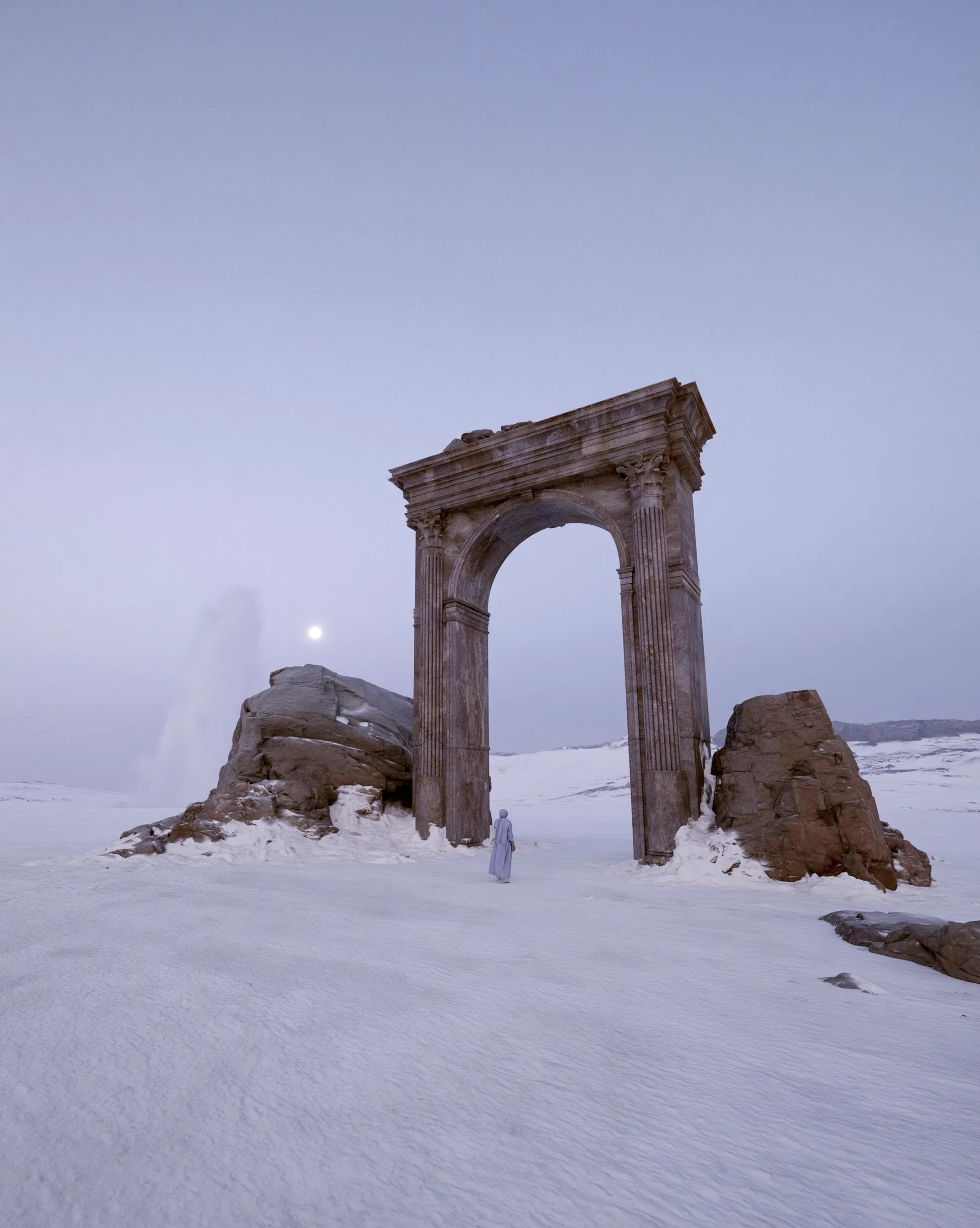 Arch in the desert at dusk